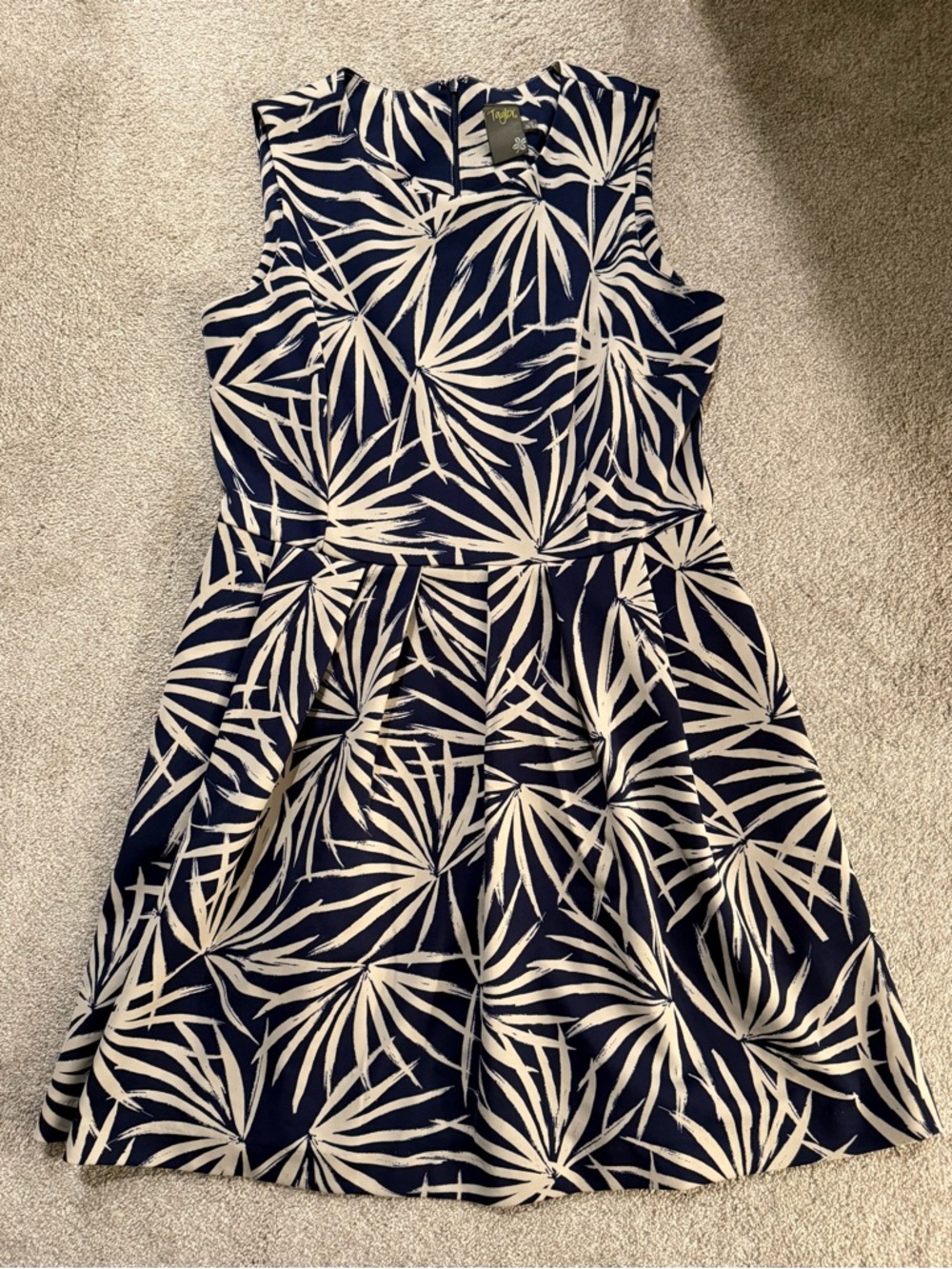 Women’s right above knee length sleeveless dress size 12. Navy with palms